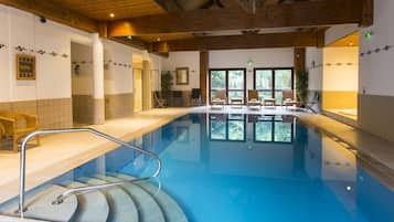 Indoor pool, open 7:00 AM to 10:00 PM, pool loungers