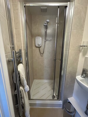 Shower, free toiletries, hair dryer, towels