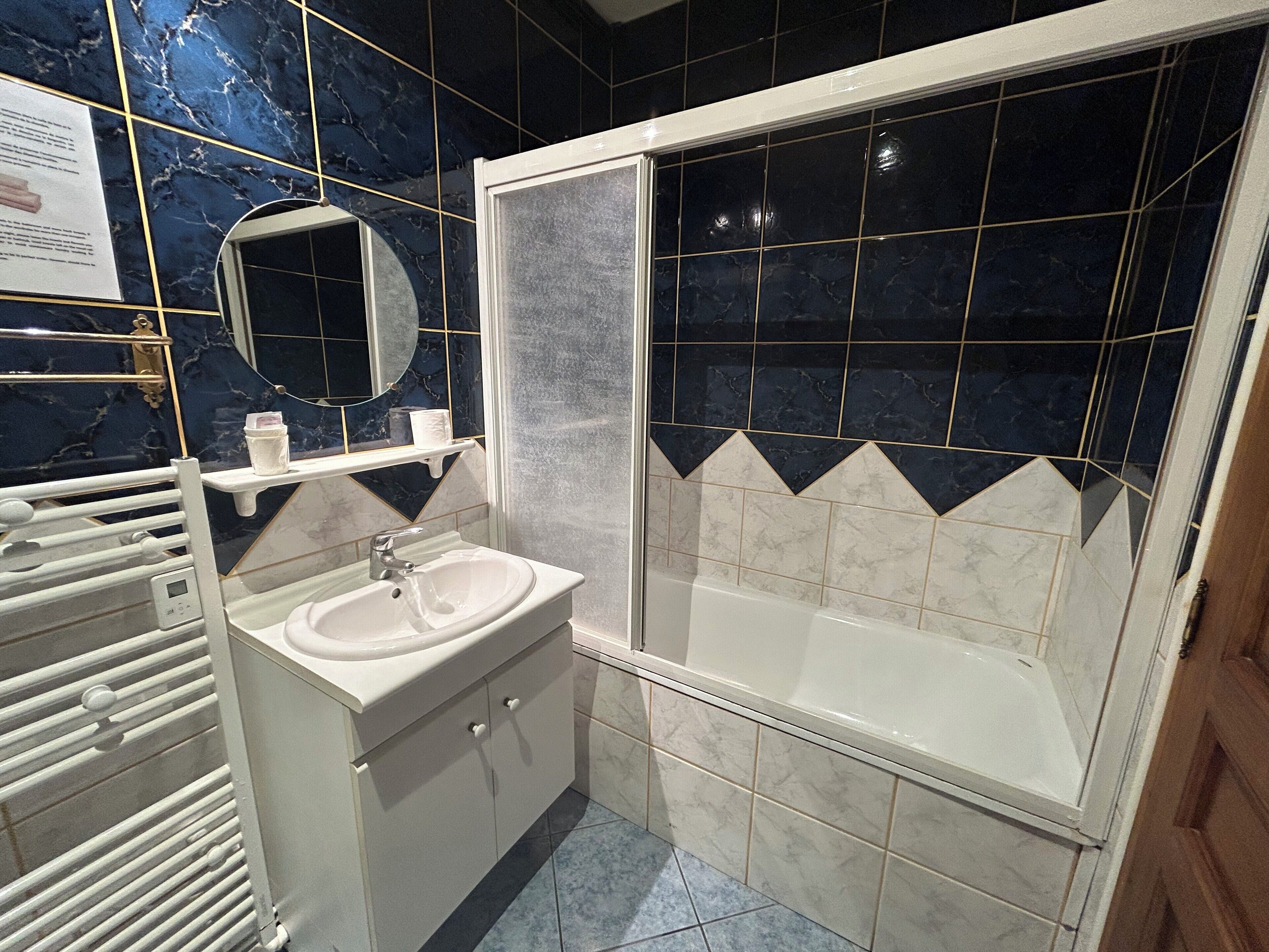 double superior, courtyard view and church | bathroom | free toiletries, hair dryer, towels