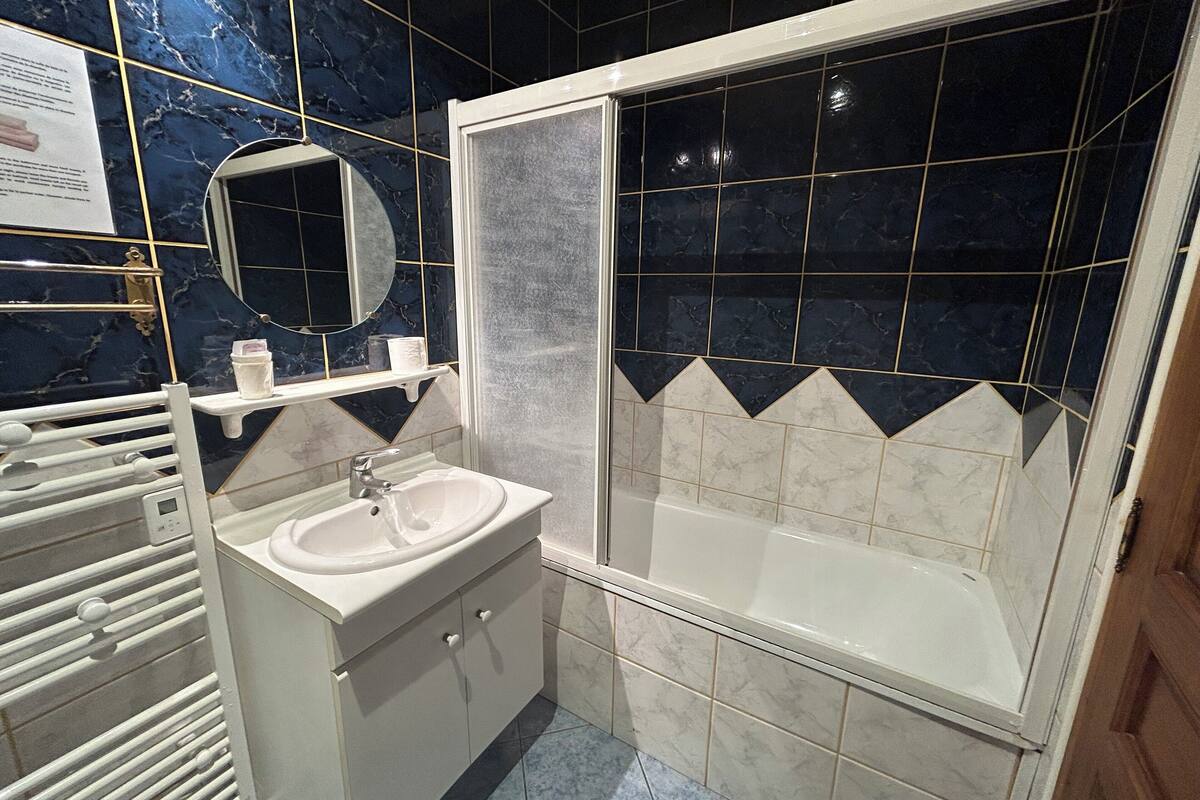 double superior, courtyard view and church | bathroom | free toiletries, hair dryer, towels