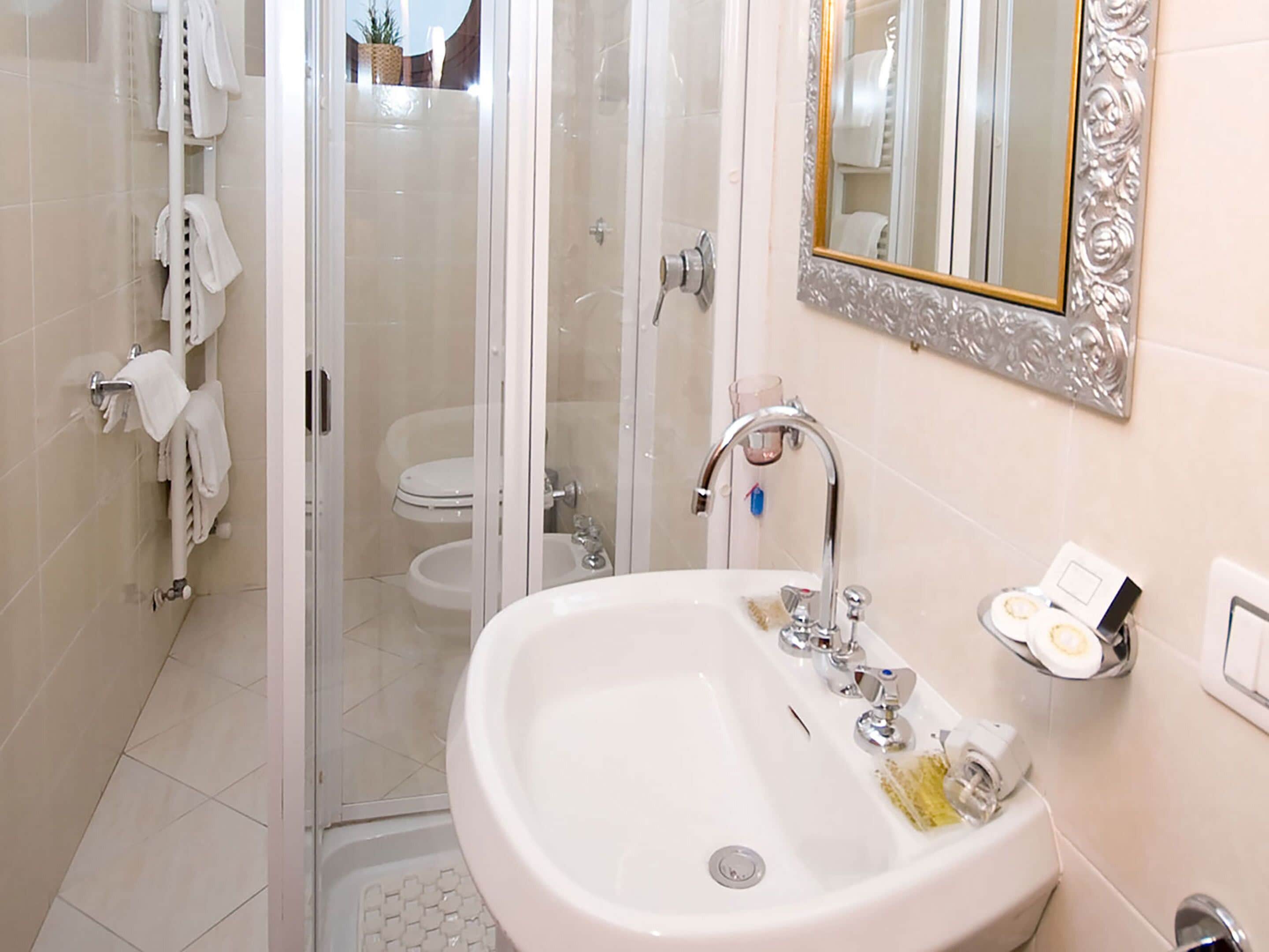 quadruple room, private bathroom | bathroom | shower, free toiletries, hair dryer, towels