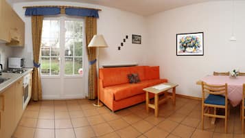 Appartement, 1 slaapkamer, uitzicht op vallei, uitzicht op gebergte | Woonruimte | Een lcd-televisie