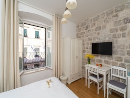 Quarto duplo (Deluxe Double or Twin Room with City ) | Sala de jantar
