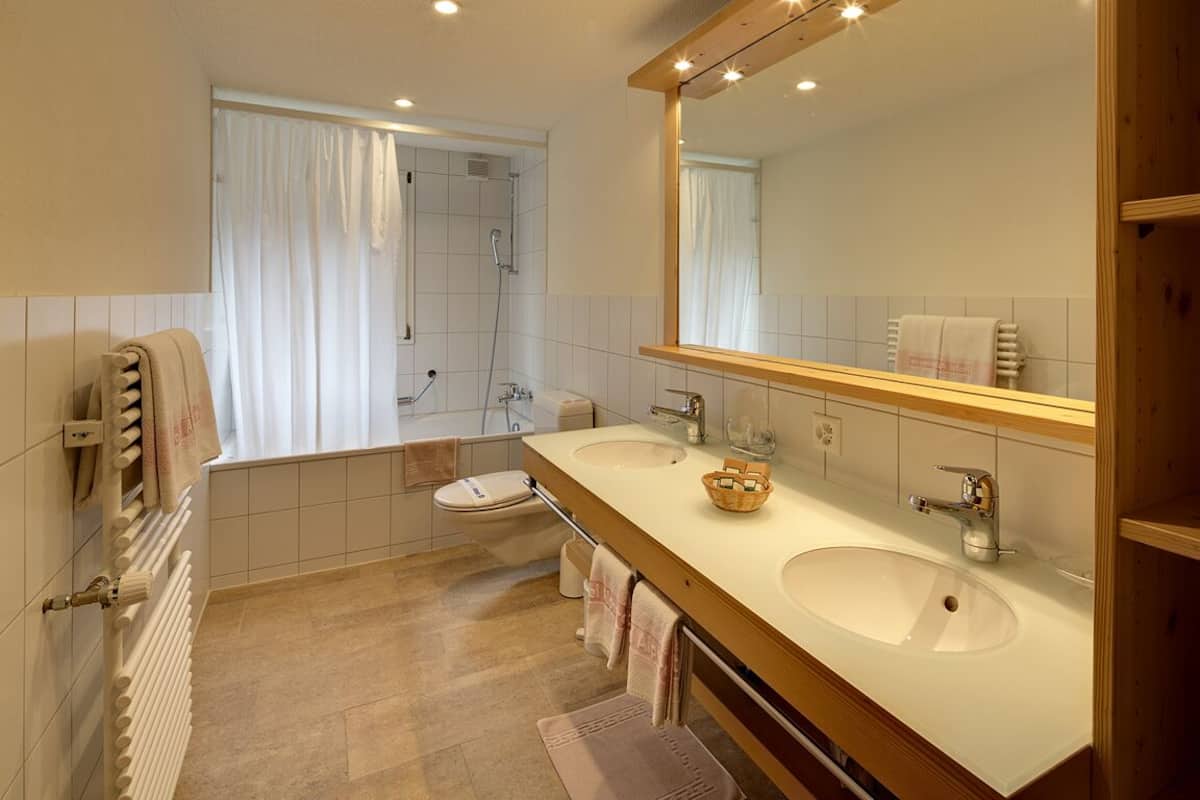 triple apartment with mountain view | bathroom | hair dryer, towels