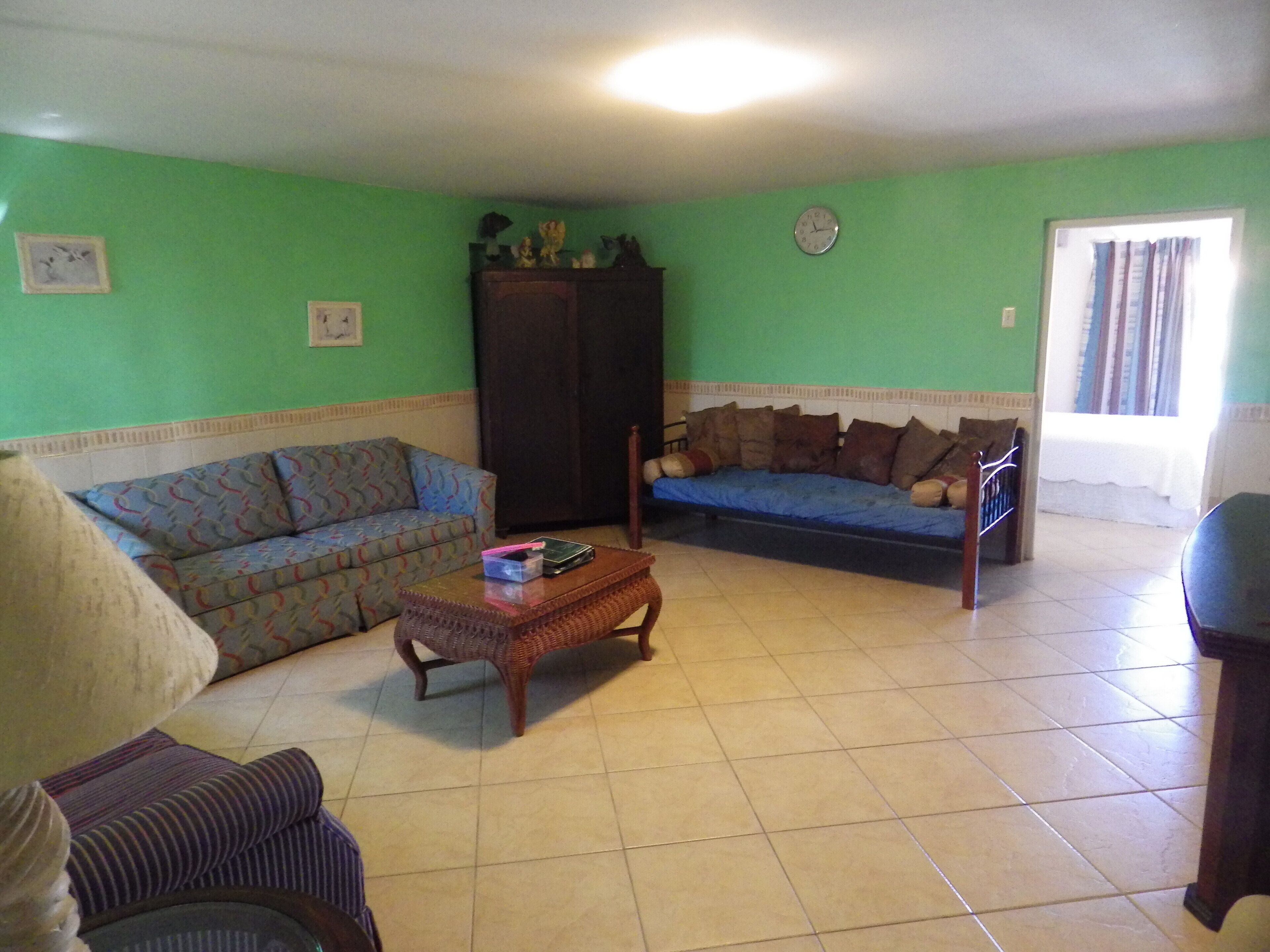 superior apartment, 1 bedroom, pool view | living room | flat-screen tv