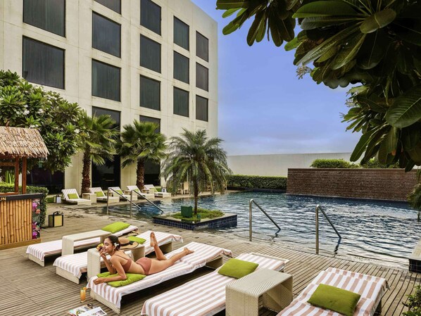Outdoor pool, sun loungers