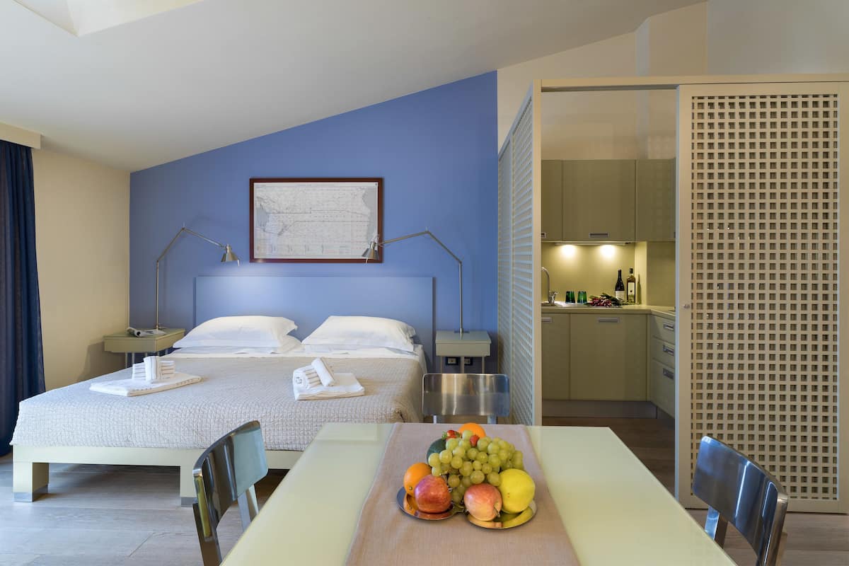 Studio, 1 Bedroom, Accessible, Kitchen | Down comforters, in-room safe, individually furnished, desk