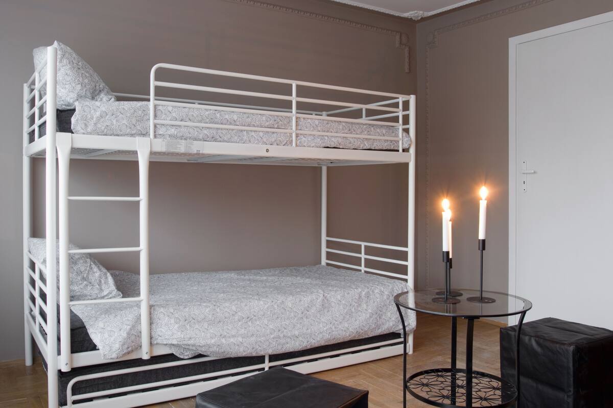 Iron/ironing board, cribs (free), WiFi (free), bed sheets