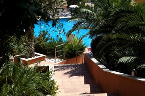 Seasonal outdoor pool, open 10:30 AM to 7:00 PM, sun loungers