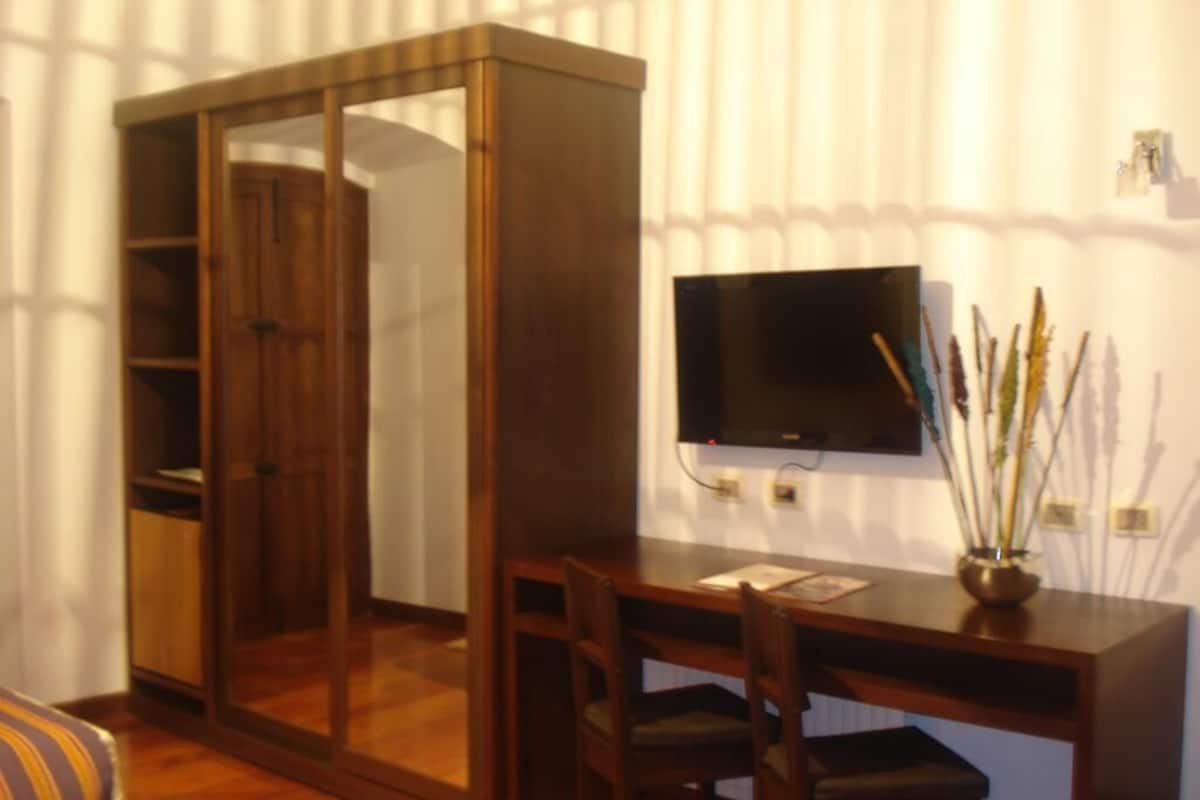 Luxe beddengoed, donzen dekbedden, Select Comfort-bedden, een minibar