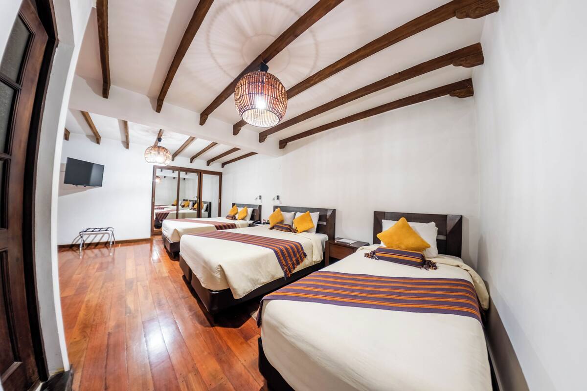 Standard Triple Room | Premium bedding, down duvets, Select Comfort beds, minibar