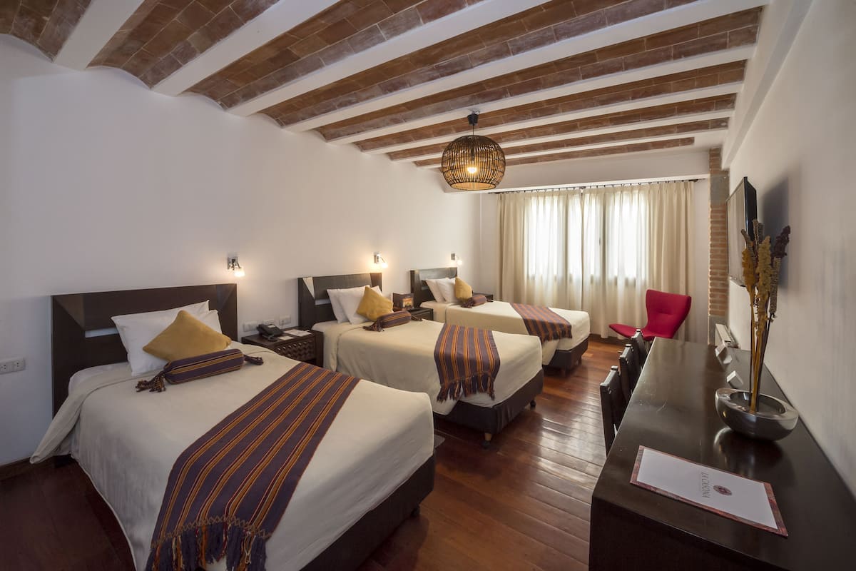 standard triple room | premium bedding, down duvets, select comfort beds, minibar