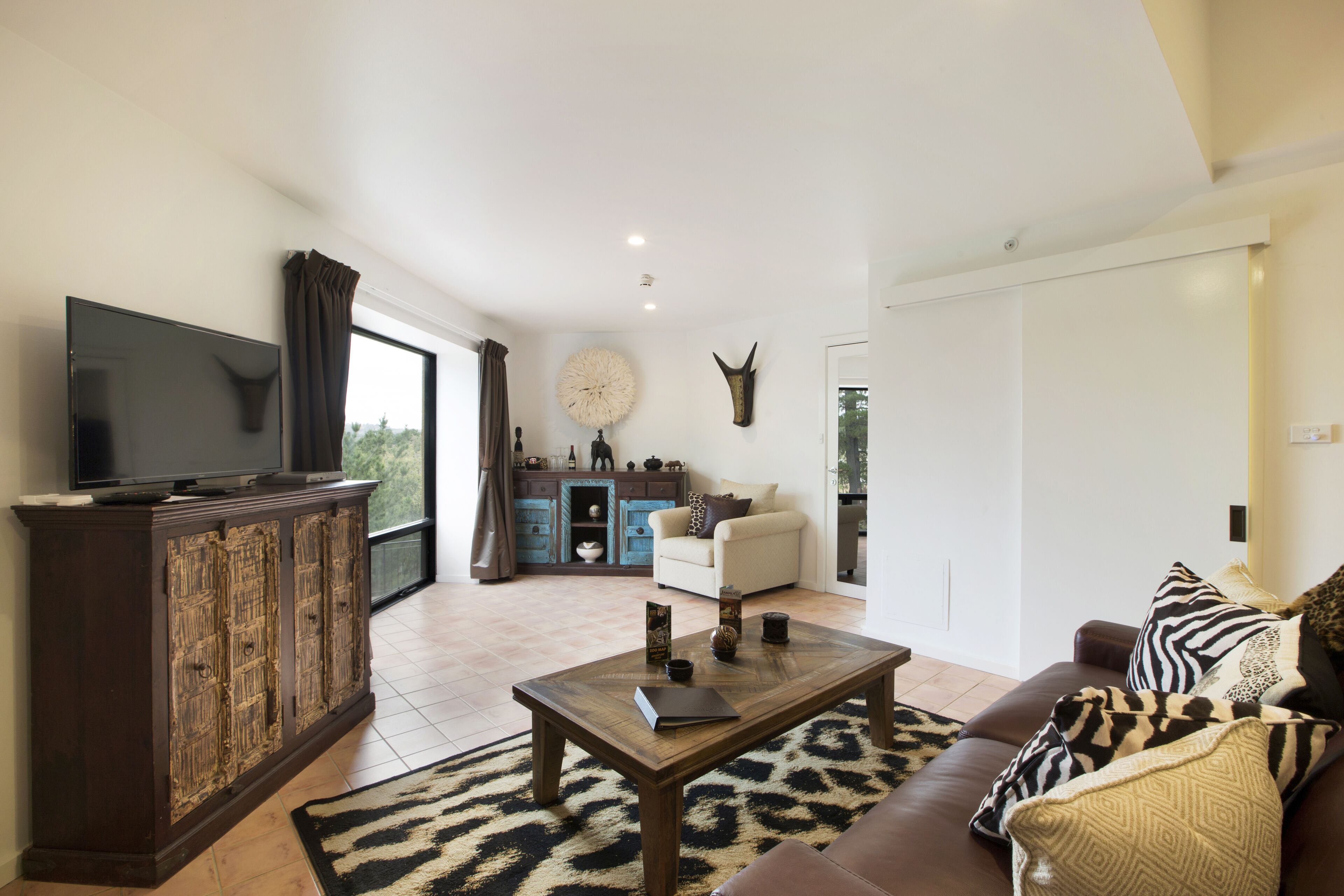 Wild Encounter Room (Meet a Cheetah experience for 2) | Egyptian cotton sheets, premium bedding, pillowtop beds, minibar