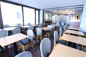 Enjoy a casual dining experience at this inviting space with comfortable seating and a warm atmosphere.