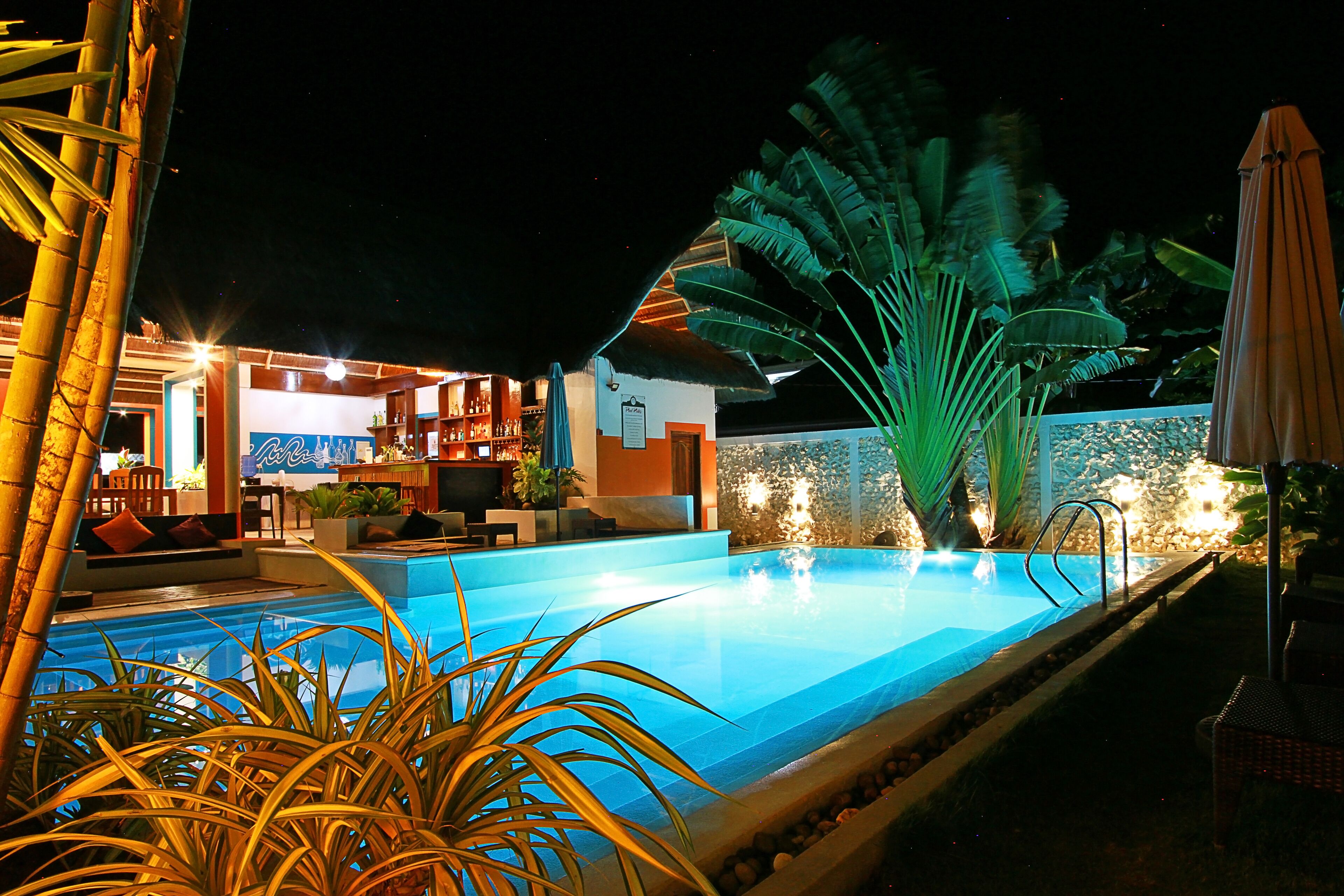 outdoor pool, pool umbrellas, pool loungers