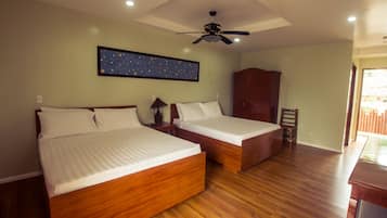 Deluxe Room, 2 Queen Beds, Partial Ocean View | In-room safe, desk, soundproofing, iron/ironing board