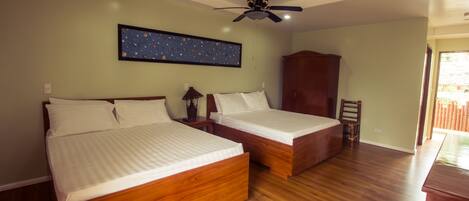 Deluxe Room, 2 Queen Beds, Partial Ocean View | In-room safe, desk, soundproofing, iron/ironing board
