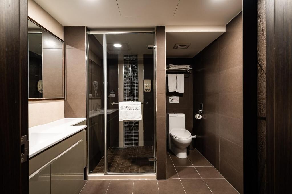 Standard Double Room | Bathroom | Shower, free toiletries, hair dryer, slippers