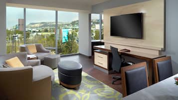 Junior Suite, 1 Bedroom | Living room | 32-inch LCD TV with cable channels, TV