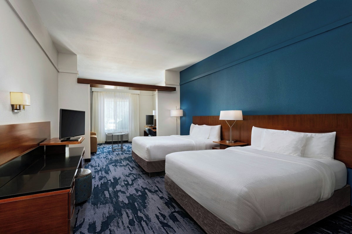 Room, Multiple Beds, Non Smoking | Living area | 32-inch LCD TV with cable channels, TV, pay movies