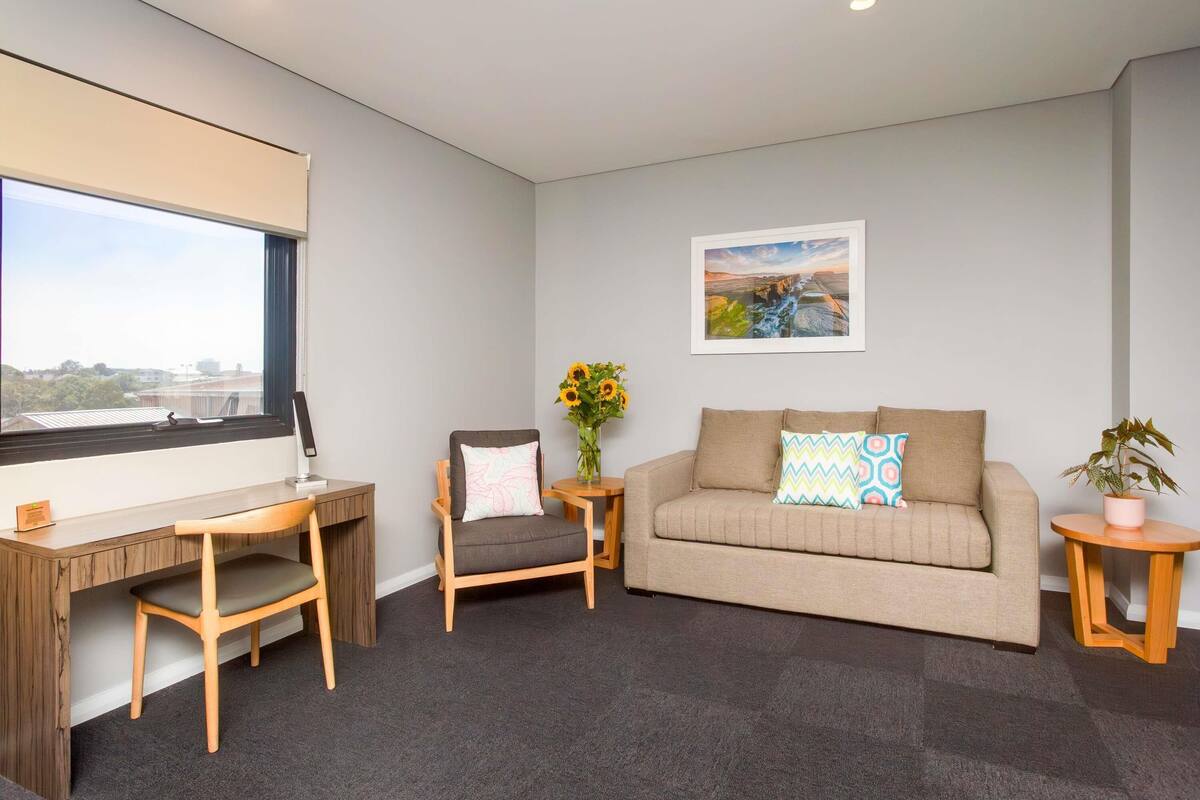 family room, 1 king bed with sofa bed, lake view | premium bedding, in-room safe, desk, soundproofing