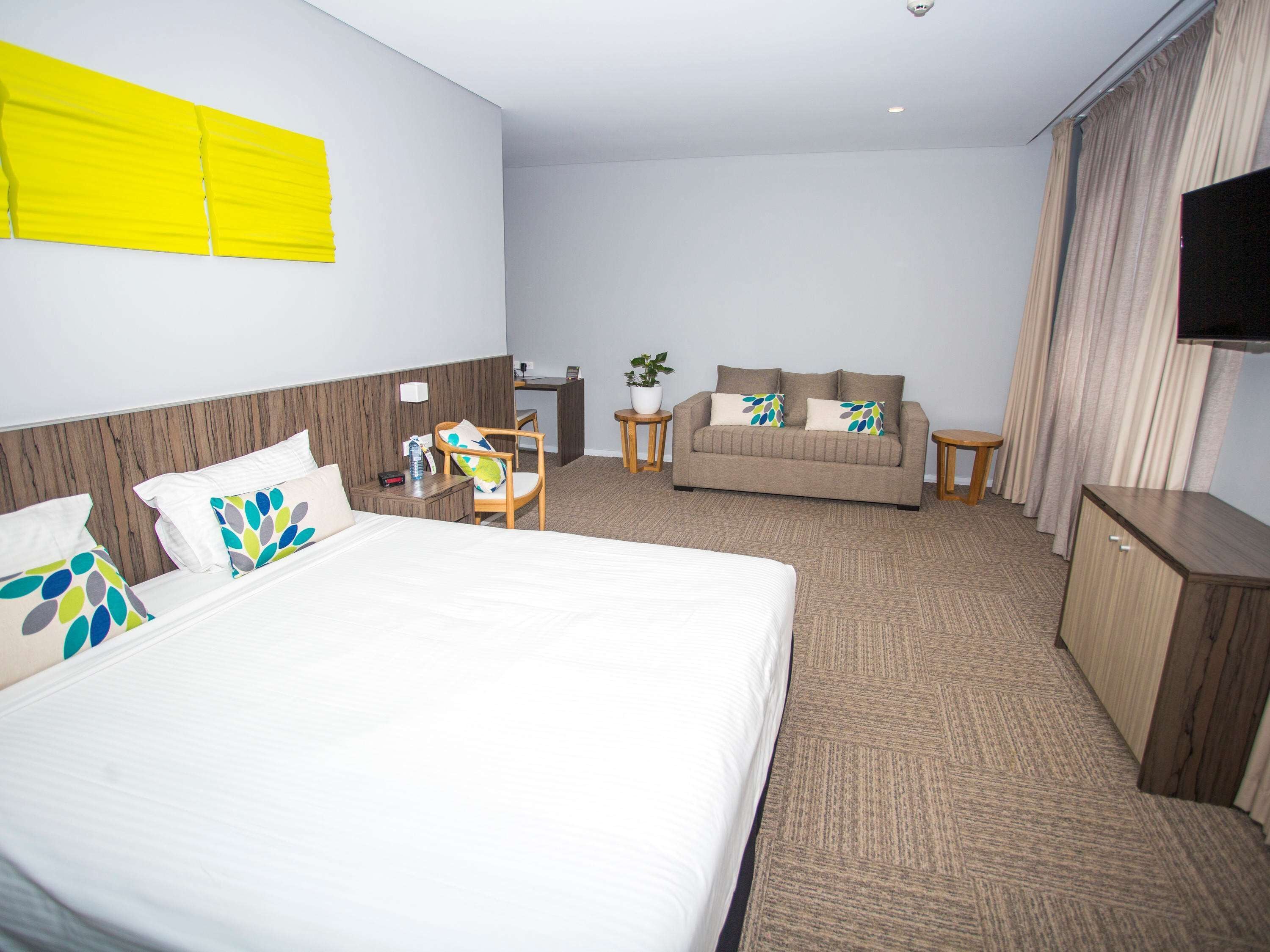 family room, 1 king bed with sofa bed, lake view | premium bedding, in-room safe, desk, soundproofing