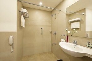 Executive Suite, 1 King Bed, Garden View | Bathroom | Shower, designer toiletries, hair dryer, bathrobes