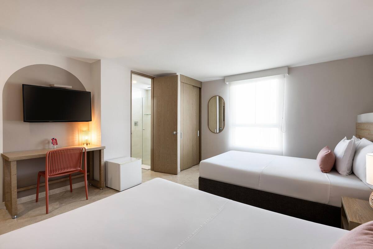 Select Comfort beds, minibar, in-room safe, desk