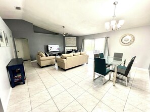 Economy House | Living area | Flat-screen TV - Orlando Select Vacation Homes (Kissimmee)