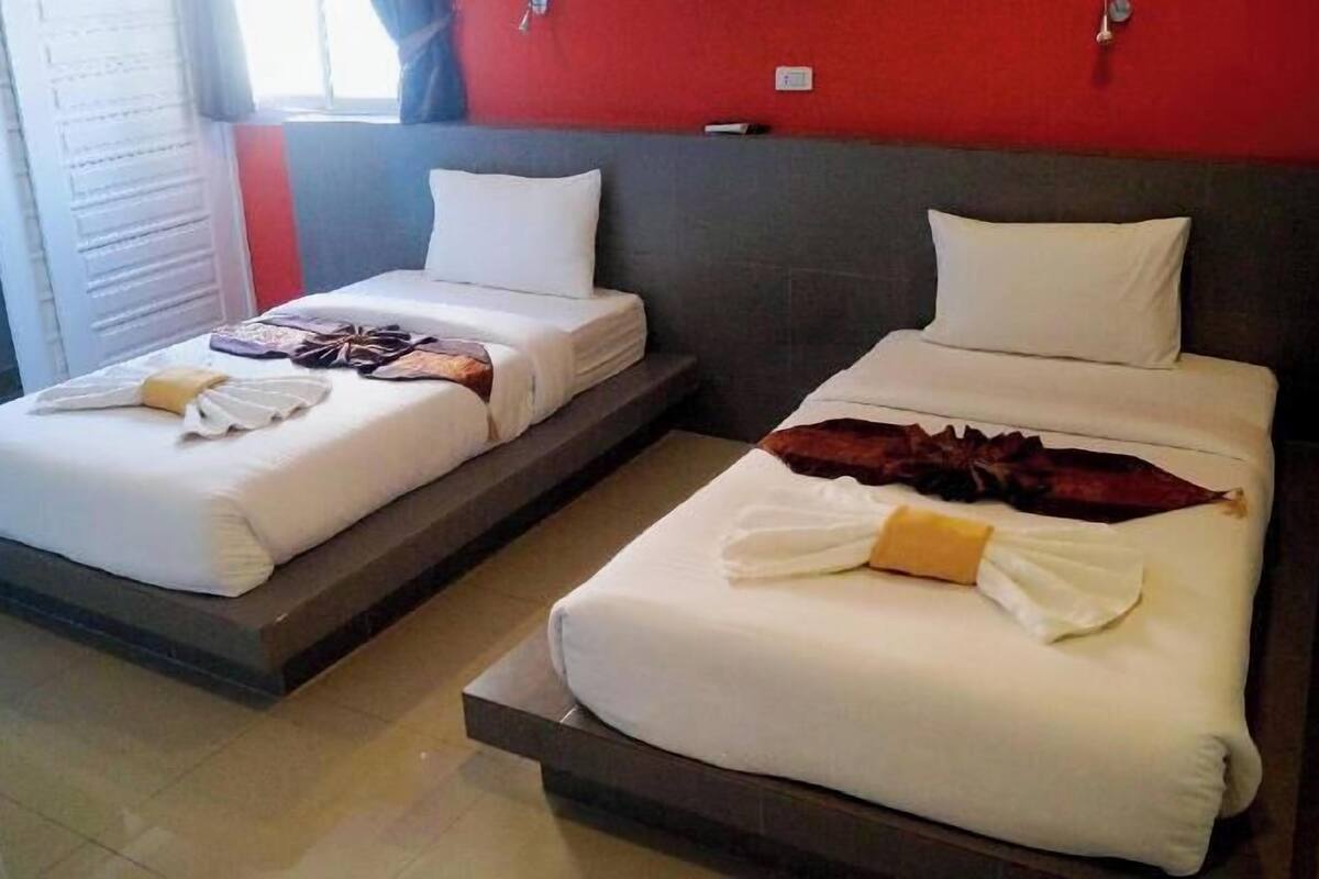 Desk, laptop workspace, free WiFi, bed sheets