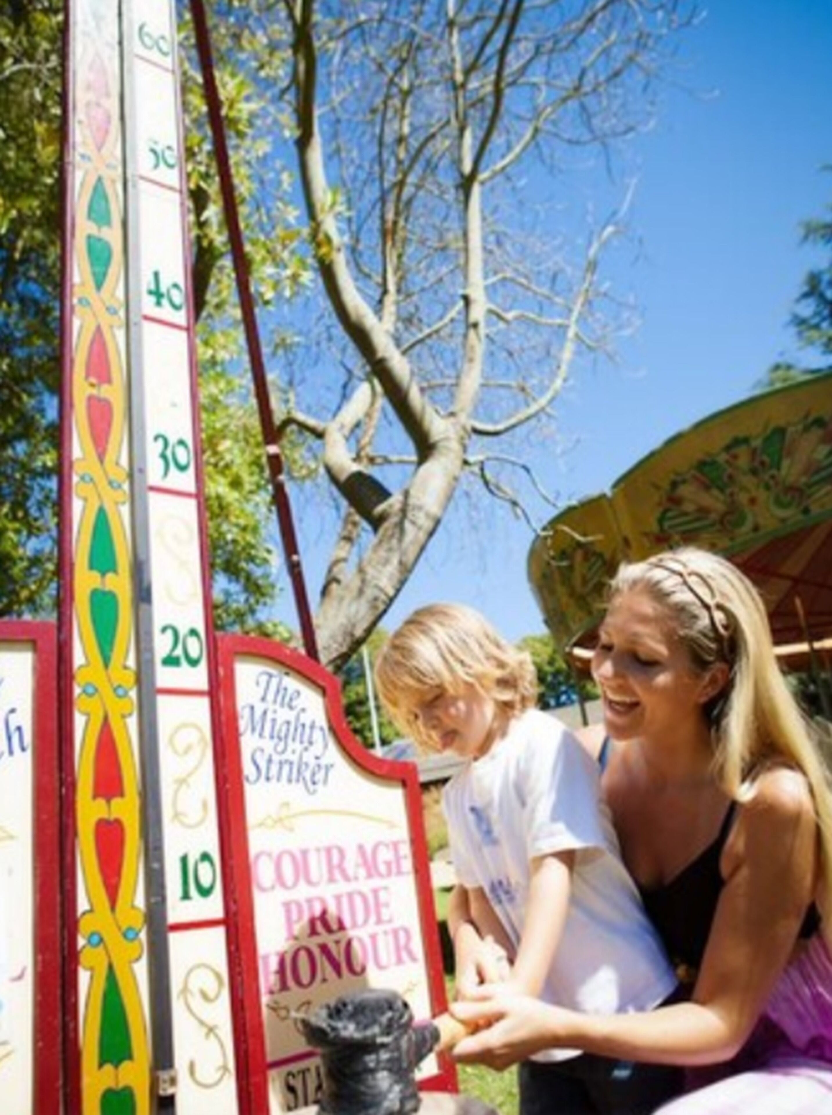 A tall, decorative pole with numbered sections and a sign that reads "The Mighty Stinker".