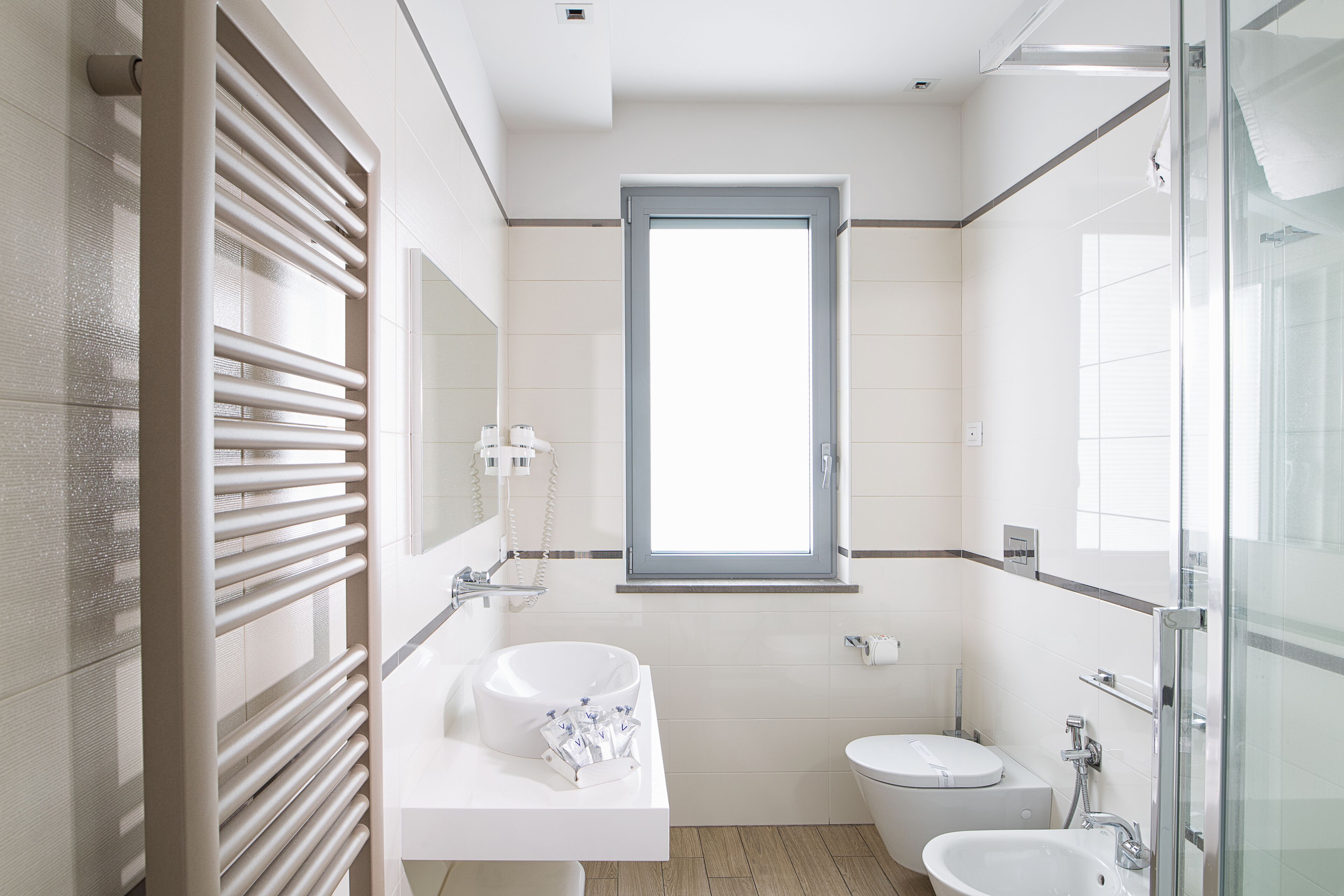 shower, free toiletries, hair dryer, slippers