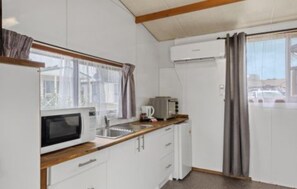 Economy Cabin - Sleeps 4  | Private kitchen | Fridge, microwave, coffee/tea maker, electric kettle