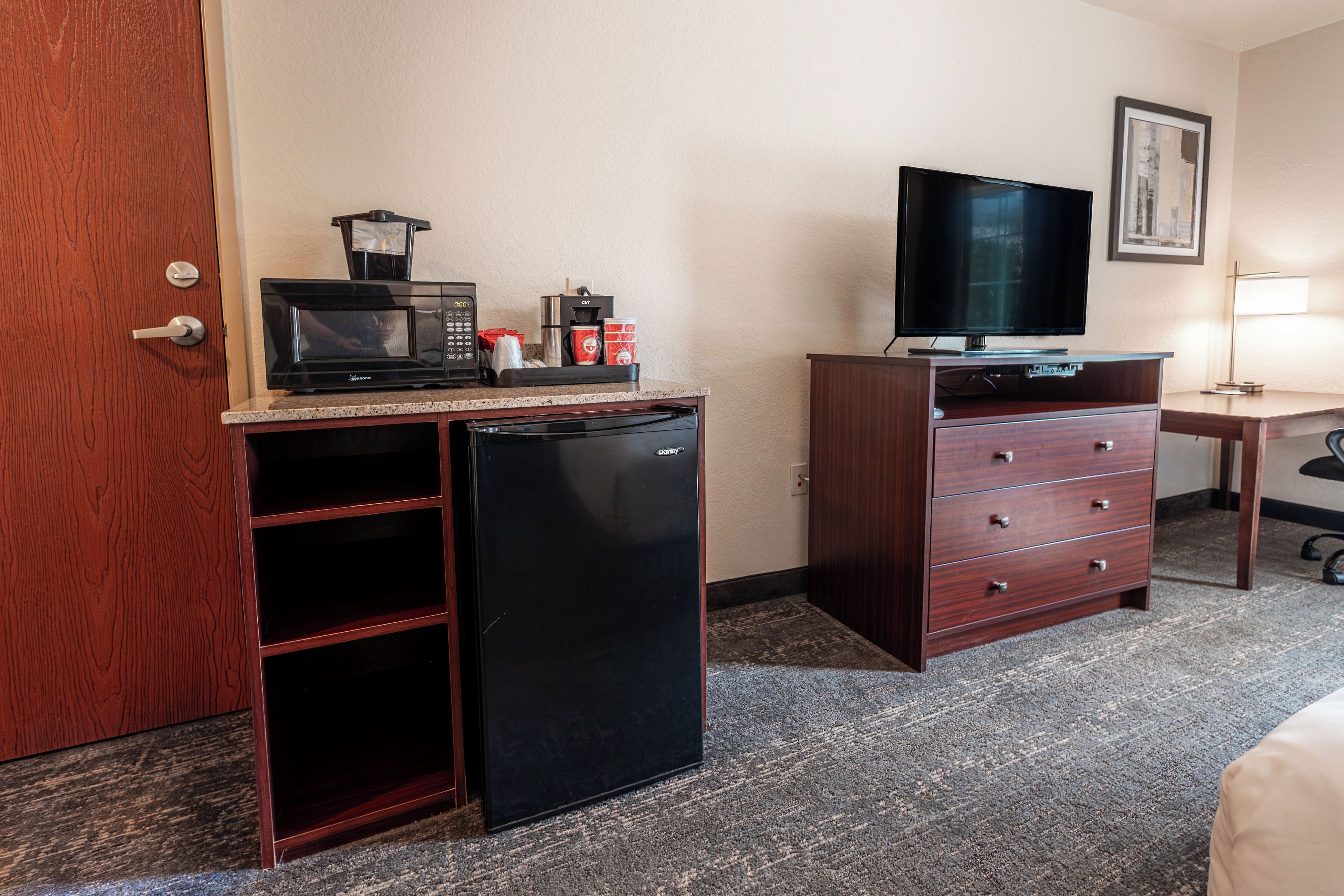 desk, laptop workspace, blackout curtains, iron/ironing board