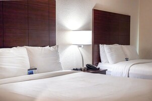 Room, 2 Queen Beds, Non Smoking | Desk, laptop workspace, blackout drapes, iron/ironing board