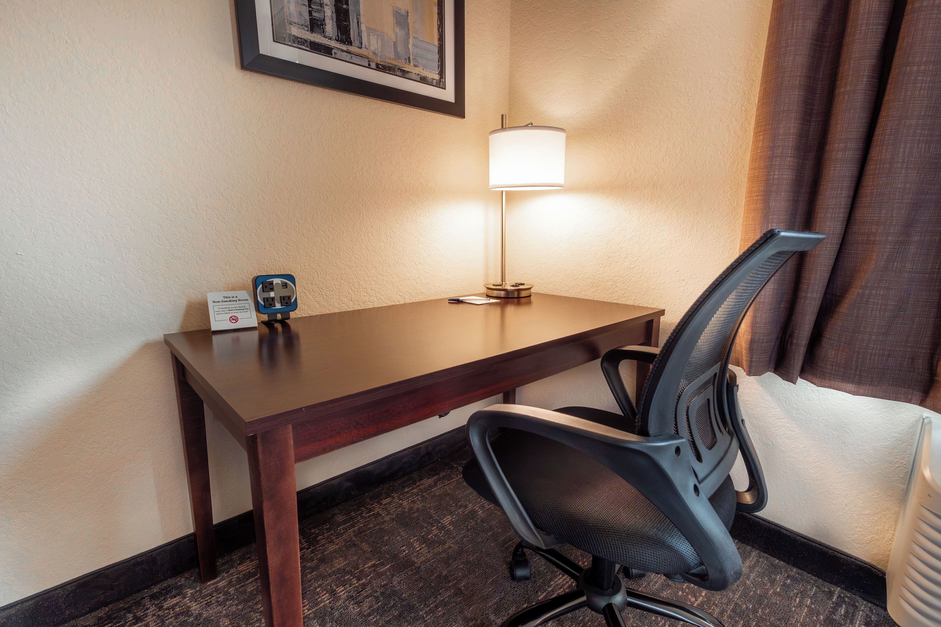 desk, laptop workspace, blackout curtains, iron/ironing board