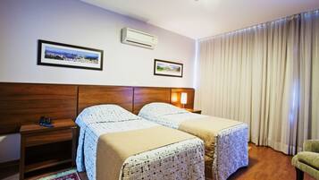 Deluxe Single Room | Minibar, laptop workspace, blackout curtains, free cots/infant beds