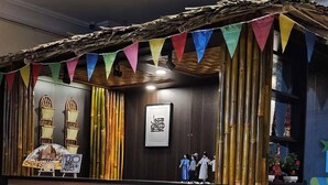 A reception area with a bamboo-themed decor, including a sign that reads "MABUHAY".