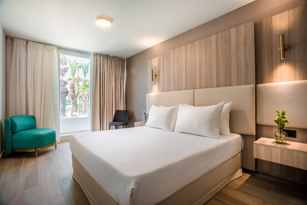 Double Room, Balcony, Pool View | In-room safe, blackout drapes, WiFi (free), bed sheets