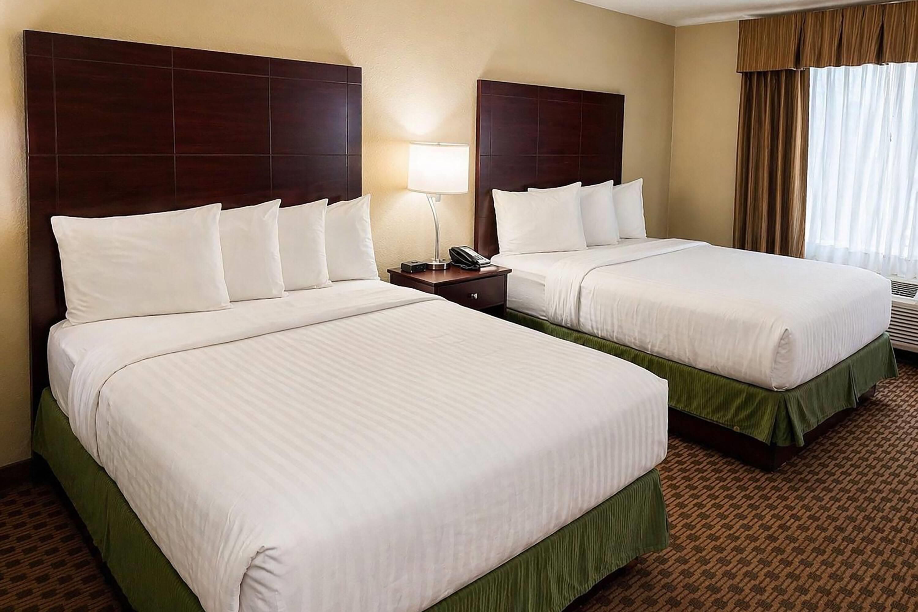 Room, 2 Queen Beds, Non Smoking | Premium bedding, in-room safe, desk, laptop workspace