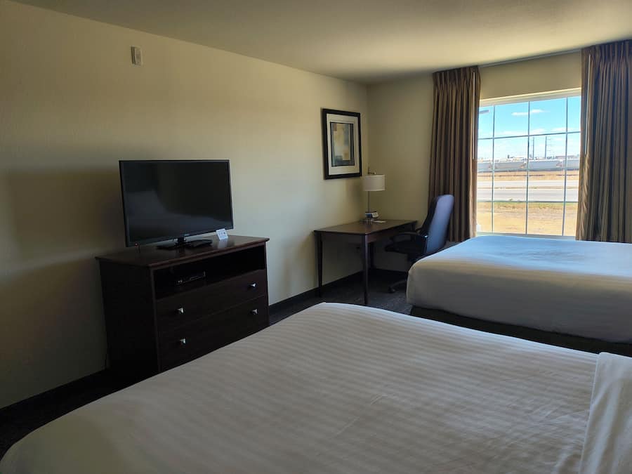 Premium bedding, down duvets, pillow-top beds, desk