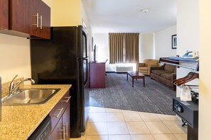 Suite, 1 King Bed with Sofa bed, Accessible, Non Smoking (Roll-in Shower) | Premium bedding, down comforters, pillowtop beds, desk - Cobblestone Inn & Suites - Eaton (Eaton)