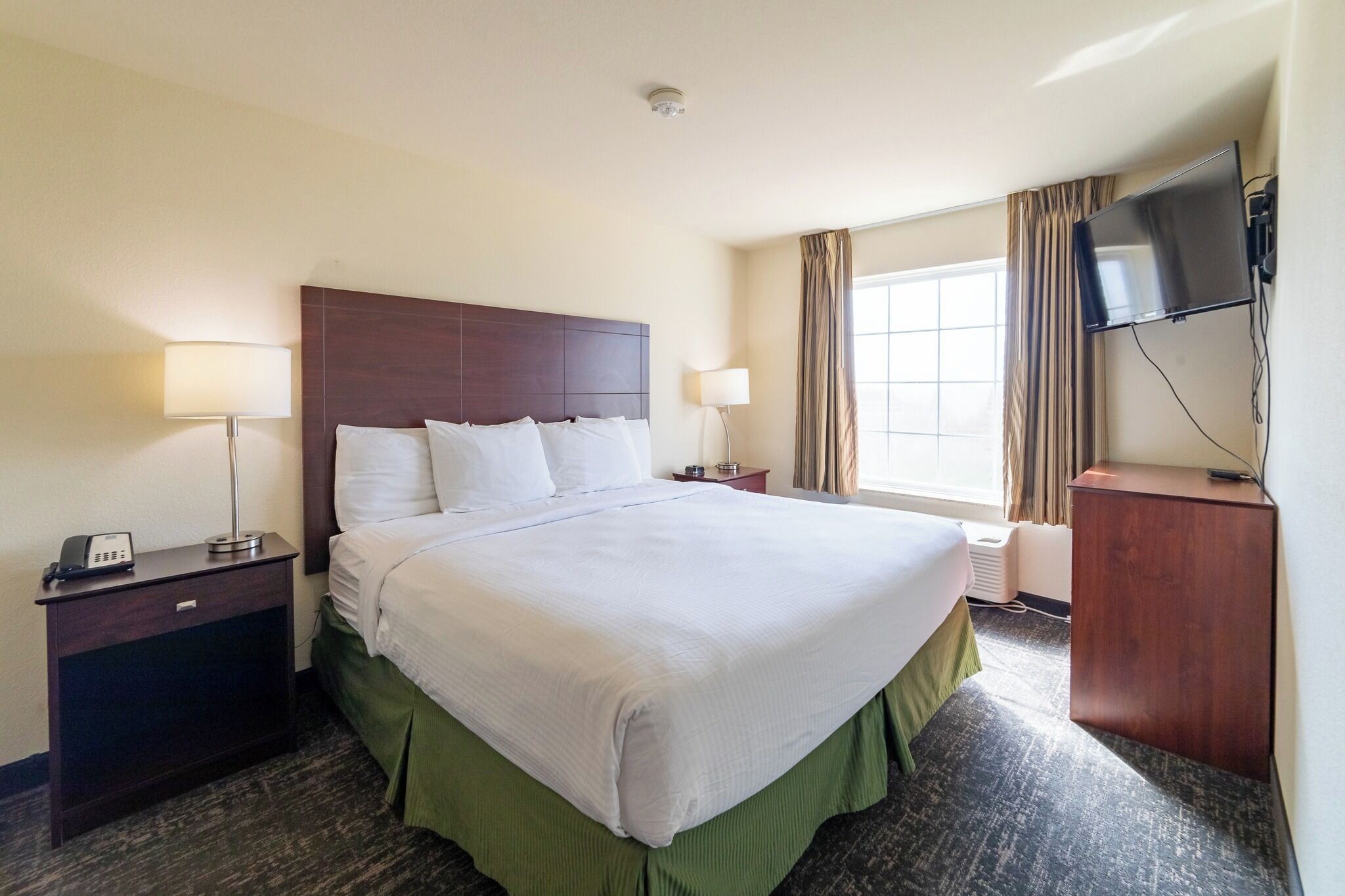 Premium bedding, down comforters, pillowtop beds, desk