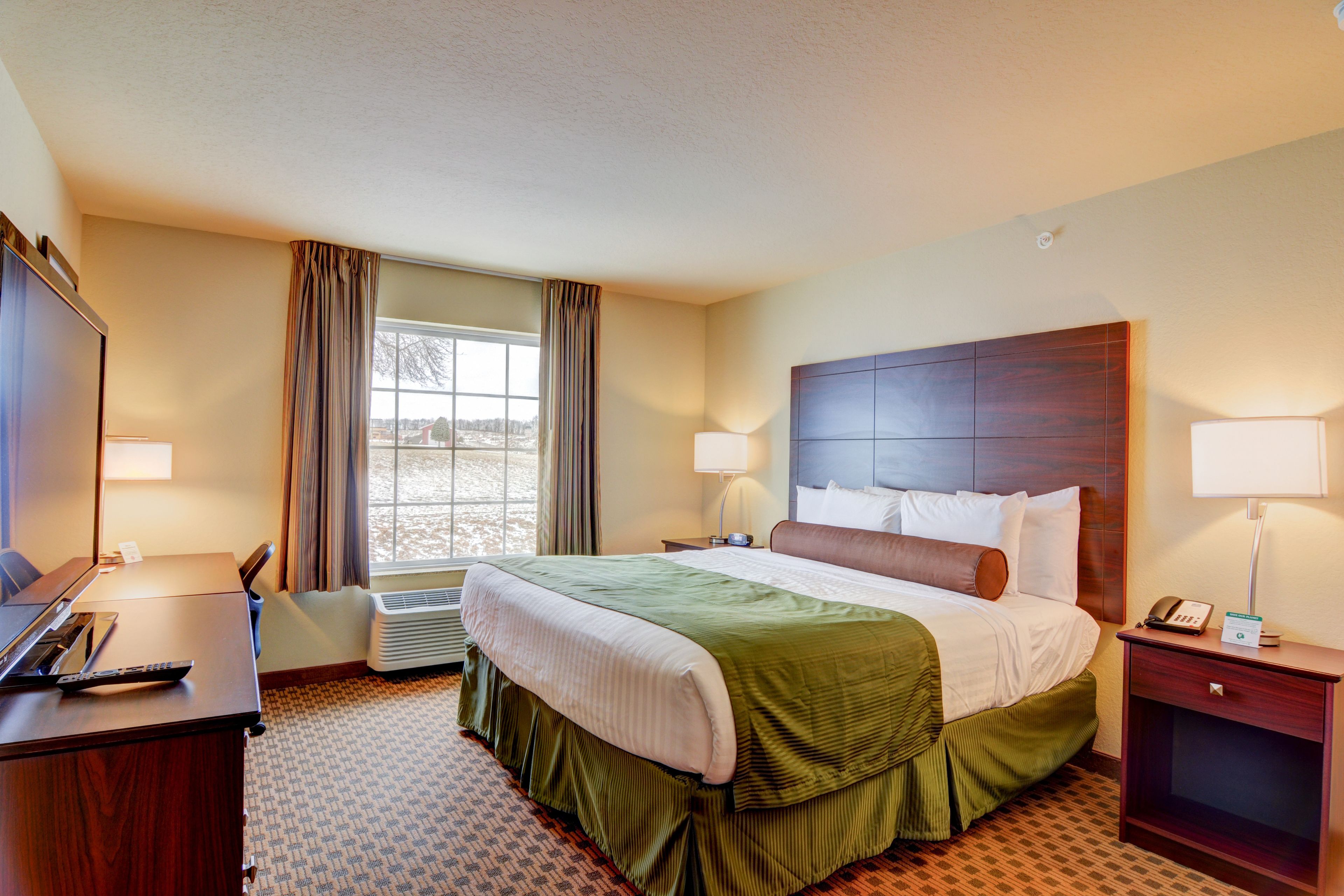 down duvets, pillow-top beds, in-room safe, desk