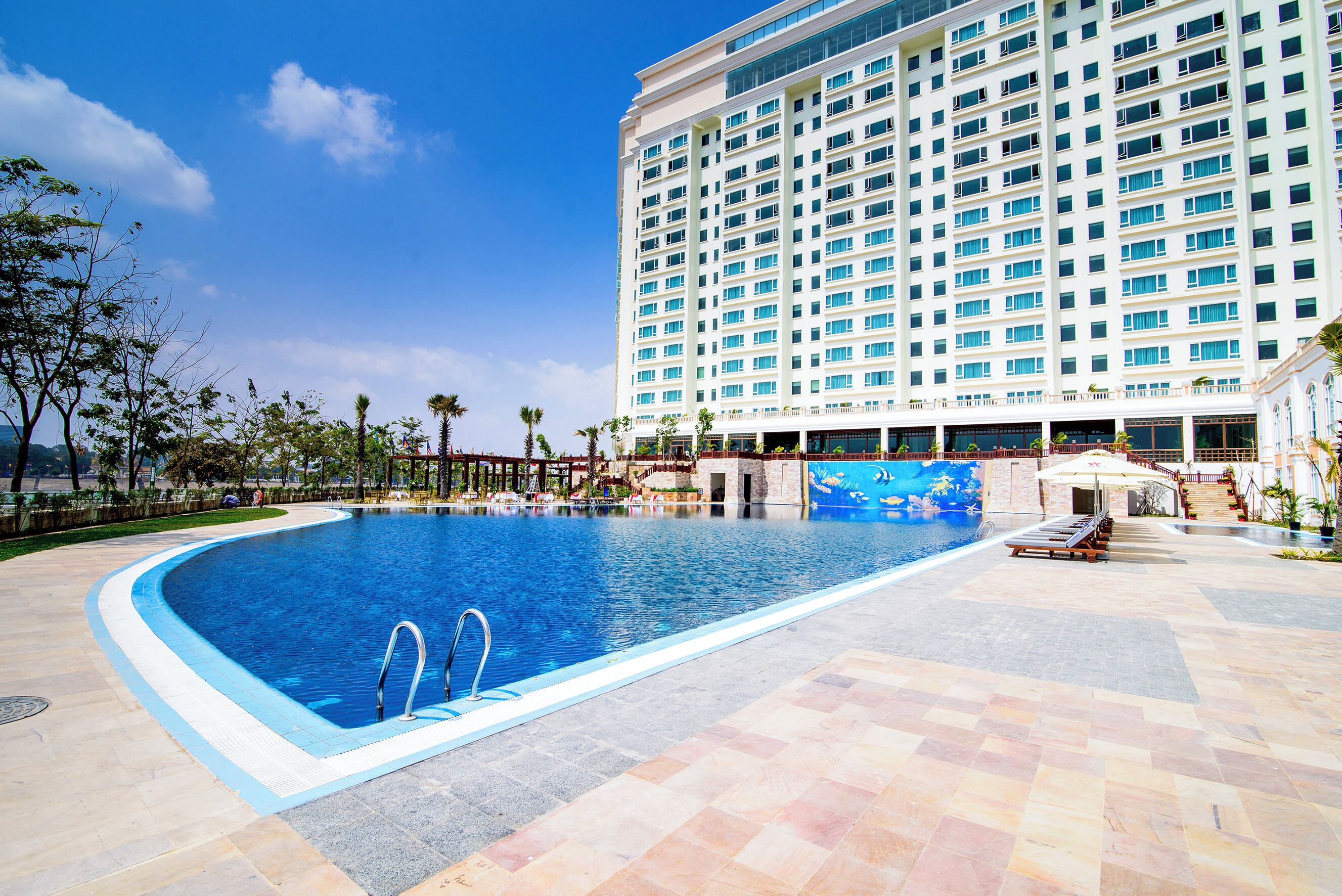 2 outdoor pools, pool umbrellas, pool loungers