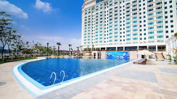 2 outdoor pools, pool umbrellas, pool loungers