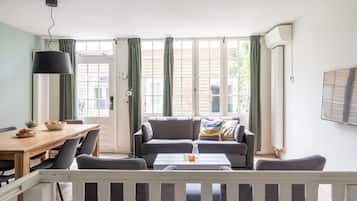 32-inch flat-screen TV with cable channels, LCD TV