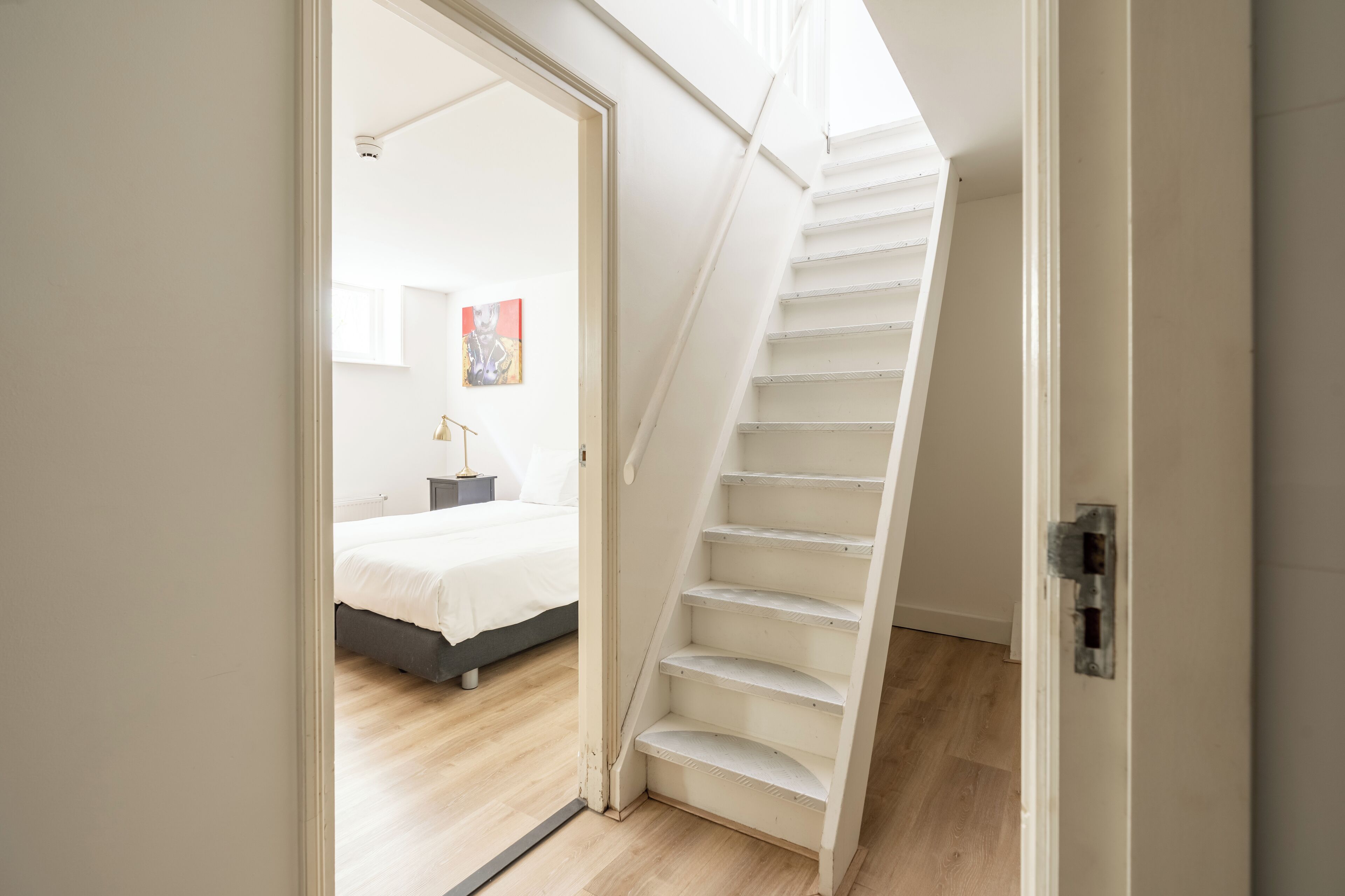 Roba de llit d'alta qualitat i caixa forta a l'habitació 