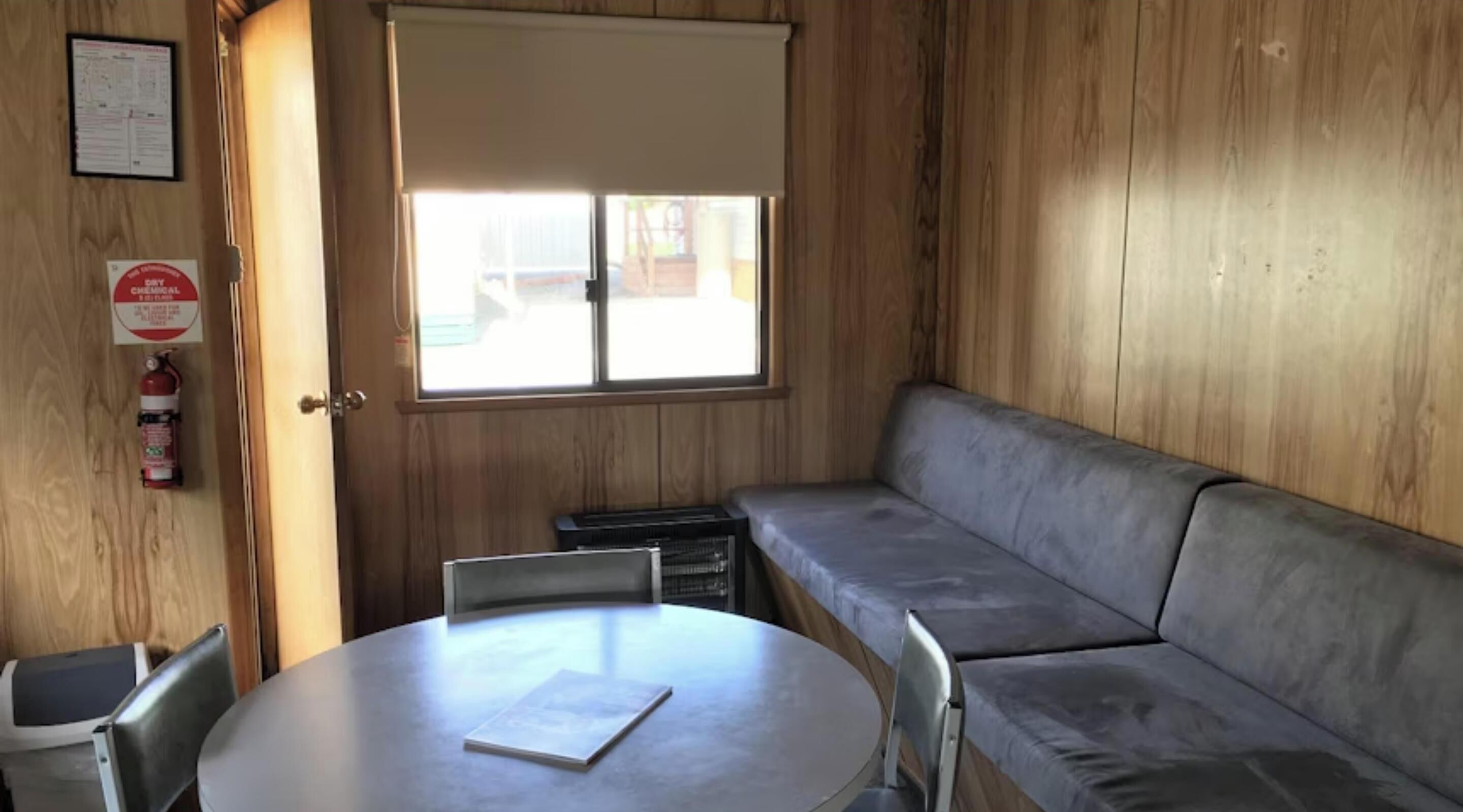 Economy Cabin - Sleeps 4 | Living area | LCD TV