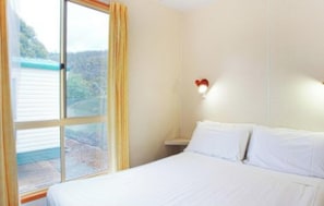 Standard Cabin - Double Sleeps 4 | Individually decorated, individually furnished, blackout drapes